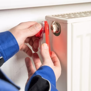 Radiator ontluchtingssleutel met opvangbak